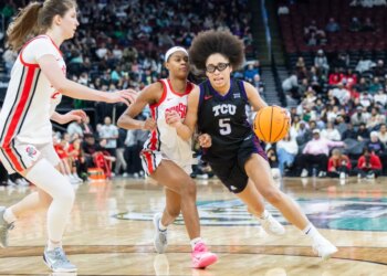 Texas Christian University Horned Frogs guard Olivia Miles (5) drives to the basket during the second half of the Coretta Scott King Classic against the Ohio State Buckeyes at the Prudential Center, Monday, Jan. 19, 2026, in Newark, NJ.