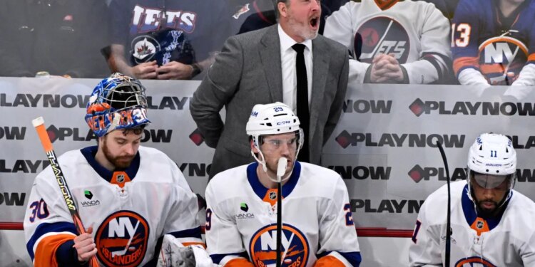 Patrick Roy shouts out instructions during the Islanders' loss to the Winnipeg Jets on Jan. 13, 2026.