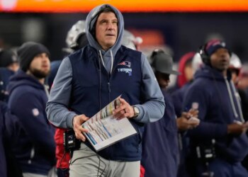 Mike Vrabel on the sidelines in the first half of an NFL wild-card playoff football game against the Los Angeles Chargers, in Foxborough, Mass., Sunday, Jan. 11, 2026.