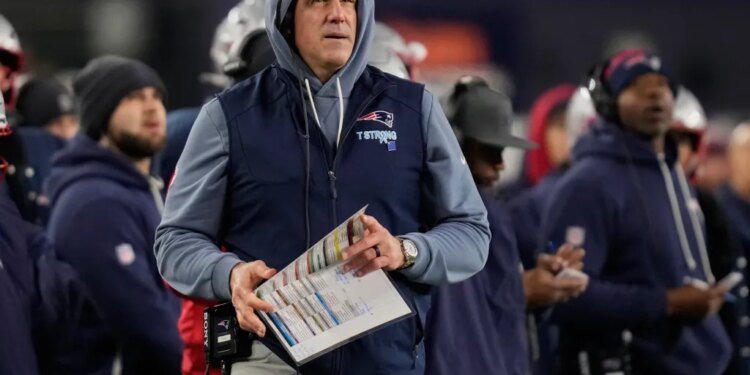 Mike Vrabel on the sidelines in the first half of an NFL wild-card playoff football game against the Los Angeles Chargers, in Foxborough, Mass., Sunday, Jan. 11, 2026.