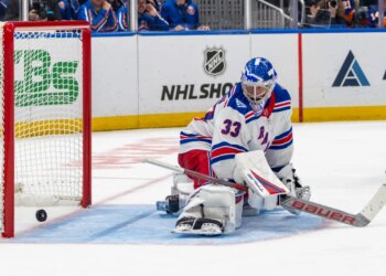 Rangers top goalie prospect Dylan Garand, giving up a goal during a preseason game, is remaining in the AHL despite Igor Shesterkin's injury.