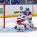 Rangers top goalie prospect Dylan Garand, giving up a goal during a preseason game, is remaining in the AHL despite Igor Shesterkin's injury.