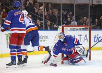 New York Rangers goaltender Jonathan Quick #32 reacts after giving up a goal to New York Islanders defenseman Carson Soucy #4 during the second period.