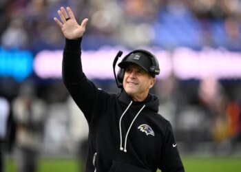 Baltimore Ravens head coach John Harbaugh greets fans before an NFL football game against the Pittsburgh Steelers, Sunday, Dec. 7, 2025, in Baltimore.