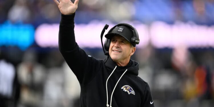 Baltimore Ravens head coach John Harbaugh greets fans before an NFL football game against the Pittsburgh Steelers, Sunday, Dec. 7, 2025, in Baltimore.