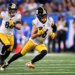 Pittsburgh Steelers wide receiver Adam Thielen (16) running with the ball against the Detroit Lions.