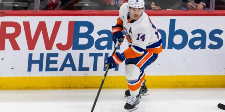 Islanders center Bo Horvat (14) skates with the puck during the third period against the New Jersey Devils at the Prudential Center, Monday, Nov. 10, 2025, in Newark, NJ.