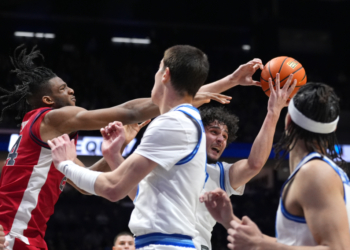 Zuby Ejiofor, battling for a rebound in St. John's win over Xavier, fouled out in the victory, but Rick Pitino thought the officials got four of those calls wrong.