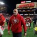 San Francisco 49ers defensive coordinator Robert Saleh leaves the field after defeating the Chicago Bears.