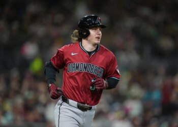 Arizona Diamondbacks' Jake McCarthy watches his home run during the third inning of a baseball game against the San Diego Padres Friday, Sept. 26, 2025, in San Diego.