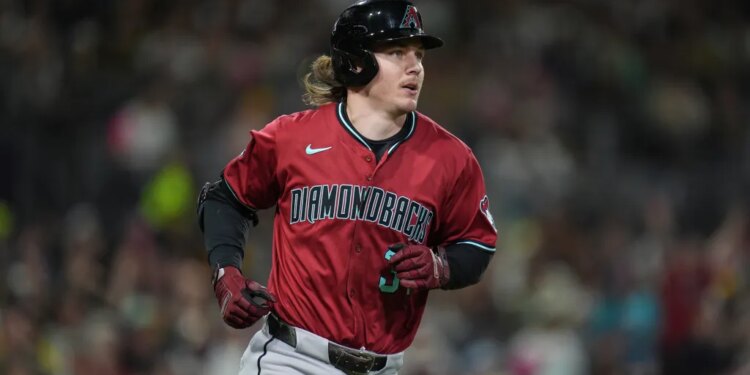 Arizona Diamondbacks' Jake McCarthy watches his home run during the third inning of a baseball game against the San Diego Padres Friday, Sept. 26, 2025, in San Diego.