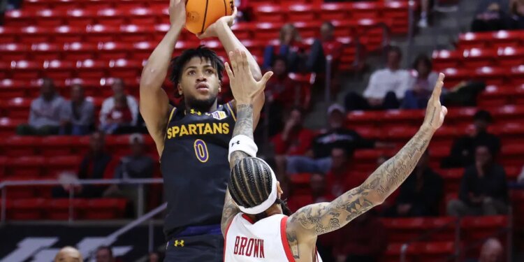 San Jose State's Colby Garland shooting over Utah's Terrence Brown.