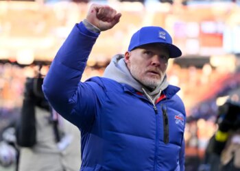 Buffalo Bills head coach Sean McDermott waving to fans.