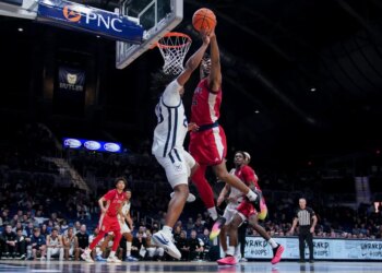 Zuby Ejiofor deflects the ball away from Azavier Robinson during the second half of St. John's 84-70 road win over Butler at Hinkle Fieldhouse.