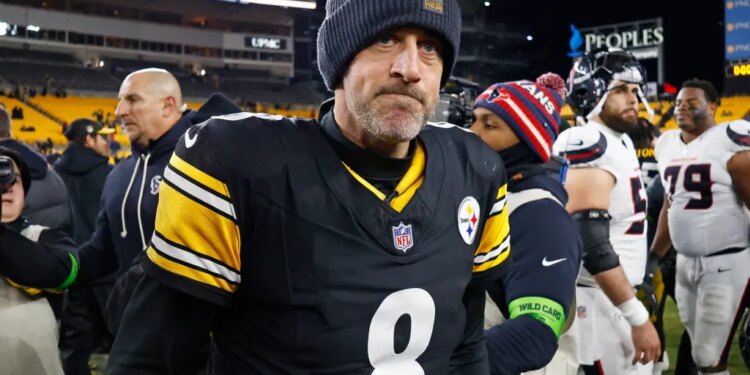 Pittsburgh Steelers quarterback Aaron Rodgers (8) walks off the field.