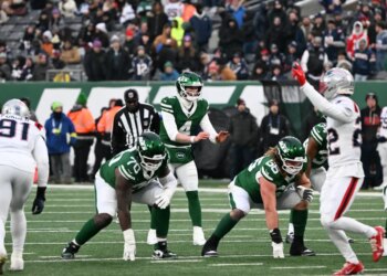 Jets quarterback Brady Cook (4) waits for the snap during the fourth quarter of the Jets and New England Patriots game in East Rutherford, NJ.