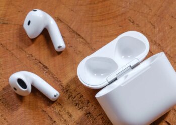 A hands-on photo of Apple’s AirPods 4 wireless earbuds.