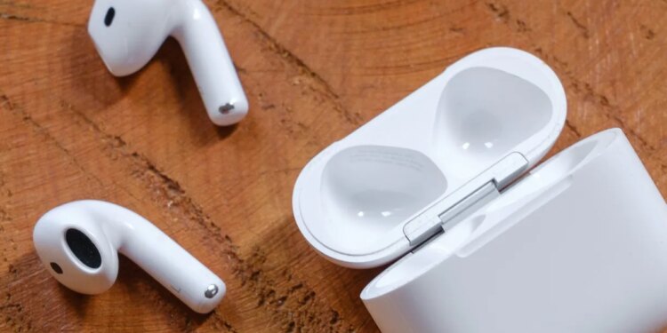 A hands-on photo of Apple’s AirPods 4 wireless earbuds.