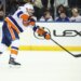 New York Islanders defenseman Alexander Romanov (28) attempts a shot on goal in the second period against the New York Rangers at Madison Square Garden.
