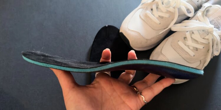 side view of the Groov insert with new Balance shoes in the background.