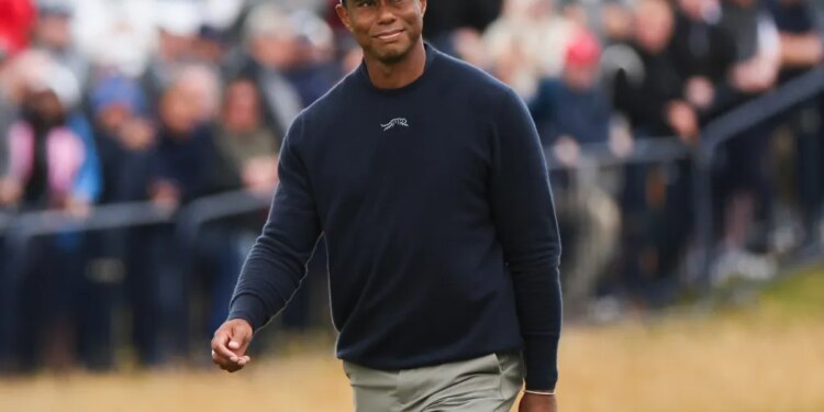 Tiger Woods looks on during the 2024 British Open at Royal Troon, an event in which he missed the cut.