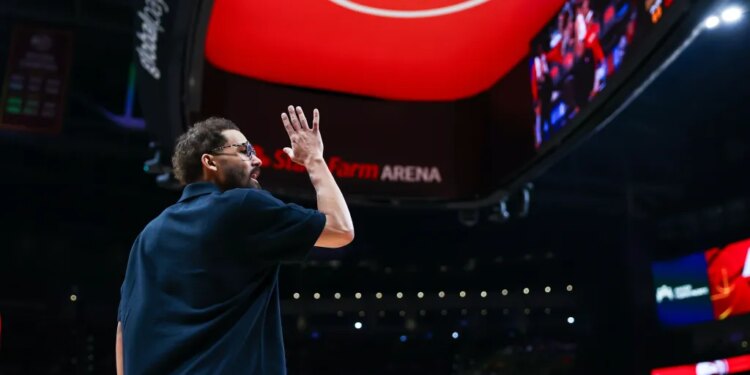 Atlanta Hawks guard Trae Young reacting during a basketball game against the New Orleans Pelicans.
