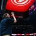 Atlanta Hawks guard Trae Young reacting during a basketball game against the New Orleans Pelicans.