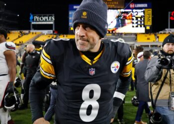 Pittsburgh Steelers quarterback Aaron Rodgers (8) walks off the field.