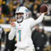 Miami Dolphins quarterback Tua Tagovailoa (1) throws the ball.