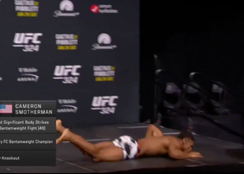 UFC fighter Cameron Smotherman collapses onto the stage during a weigh-in.