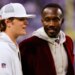 Minnesota Vikings former general manager Kwesi Adofo-Mensah, right, speaks with quarterback J.J. McCarthy before an NFL football game against the Detroit Lions, Thursday, Dec. 25, 2025, in Minneapolis.