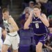 Washington forward Hannes Steinbach (6) reacts after missing a shot as Michigan State center Carson Cooper (15) heads up court.