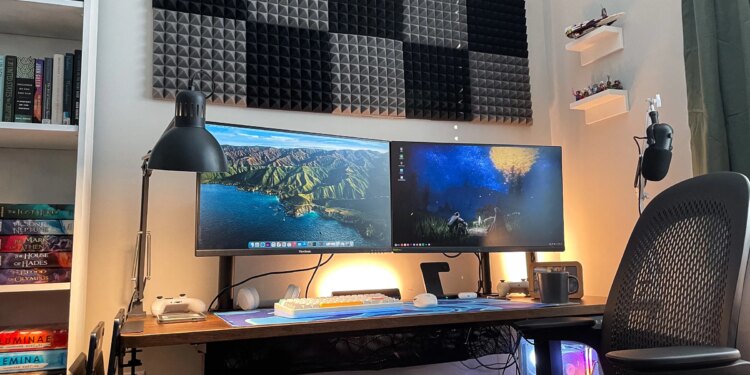 A desk with two monitors