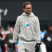 Miami Dolphins head coach Mike McDaniel in a grey hoodie with the team logo.