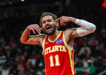 Atlanta Hawks guard Trae Young (11) yells at the referee during the game against the Chicago Bulls during the third quarter at State Farm Arena.