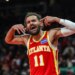 Atlanta Hawks guard Trae Young (11) yells at the referee during the game against the Chicago Bulls during the third quarter at State Farm Arena.