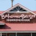 The Bahama Breeze Island Grille sign on the front of the restaurant building.