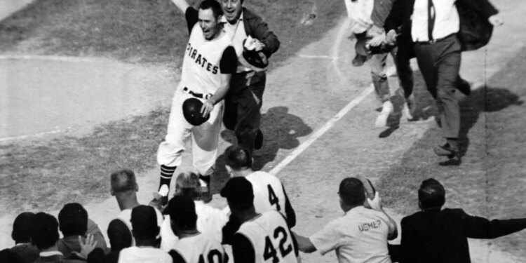 Bill Mazeroski celebrating with teammates after hitting the walk-off home run in the 1960 World Series.