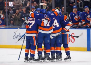 Matthew Schaefer #48 of the New York Islanders celebrated with his teammates after he scores a goal during the first period when the New York Islanders played the Pittsburgh Penguins Tuesday, February 3, 2026 at UBS Arena in Elmont, NY.
