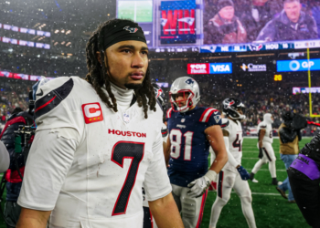 CJ Stroud walks off the field after the Texans' playoff loss to the Patriots on Jan. 18, 2026.