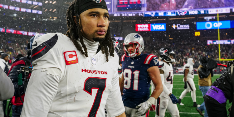 CJ Stroud walks off the field after the Texans' playoff loss to the Patriots on Jan. 18, 2026.