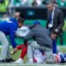 Trainers checking on New York Giants running back Cam Skattebo (44) after he twisted his ankle.