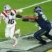 Patriots quarterback Drake Maye (10) is pressured by Seahawks defensive tackle Byron Murphy II (91) in Super Bowl 2026.