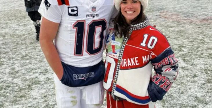 Patriots quarterback Drake Maye and his wife Ann Michael Maye  on the field after New England beat the Broncos in the AFC Championship game in Denver, Sunday, January 25, 2026.