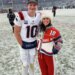 Patriots quarterback Drake Maye and his wife Ann Michael Maye  on the field after New England beat the Broncos in the AFC Championship game in Denver, Sunday, January 25, 2026.
