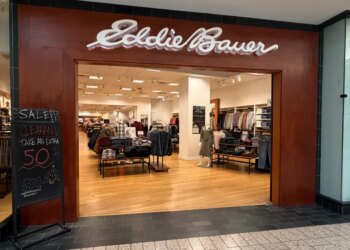 Entrance to an Eddie Bauer store with a "CLEARANCE SALE" sign.