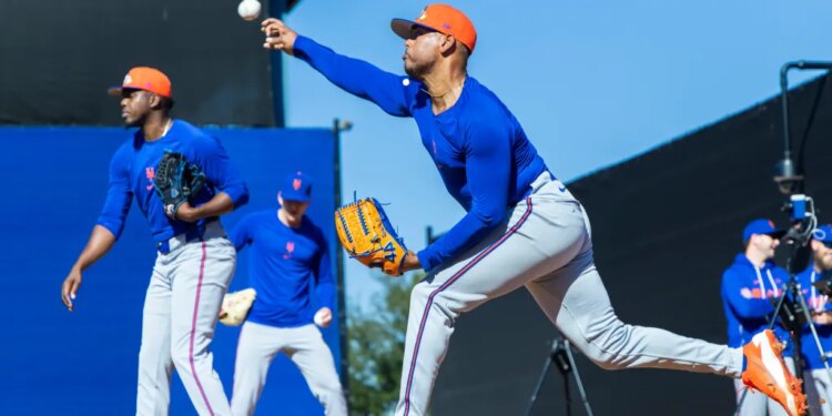 New York Mets pitcher Freddy Peralta throws a bullpen session during Spring Training.
