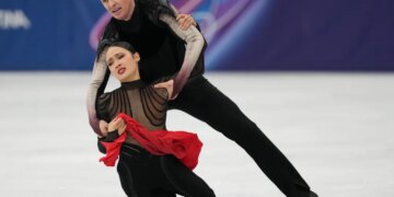 Madison Chock and Evan Bates of the United States compete during the ice dancing free skate in figure skating at the 2026 Winter Olympics, in Milan, Italy, Wednesday, Feb. 11, 2026.