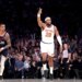 - New York Knicks forward Guerschon Yabusele #28 reacts after he hits a three-point shot over LA Clippers forward John Collins #20 during the fourth quarter.