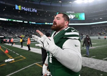Jets defensive tackle Harrison Phillips reacts on the field after the Jets beat the Atlanta Falcons 27-24.
